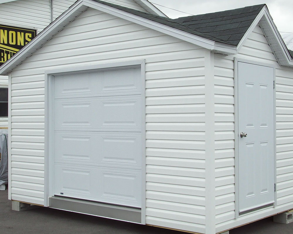 Cabanon avec porte de garage en acier – Modèle 5×6 et 6×6